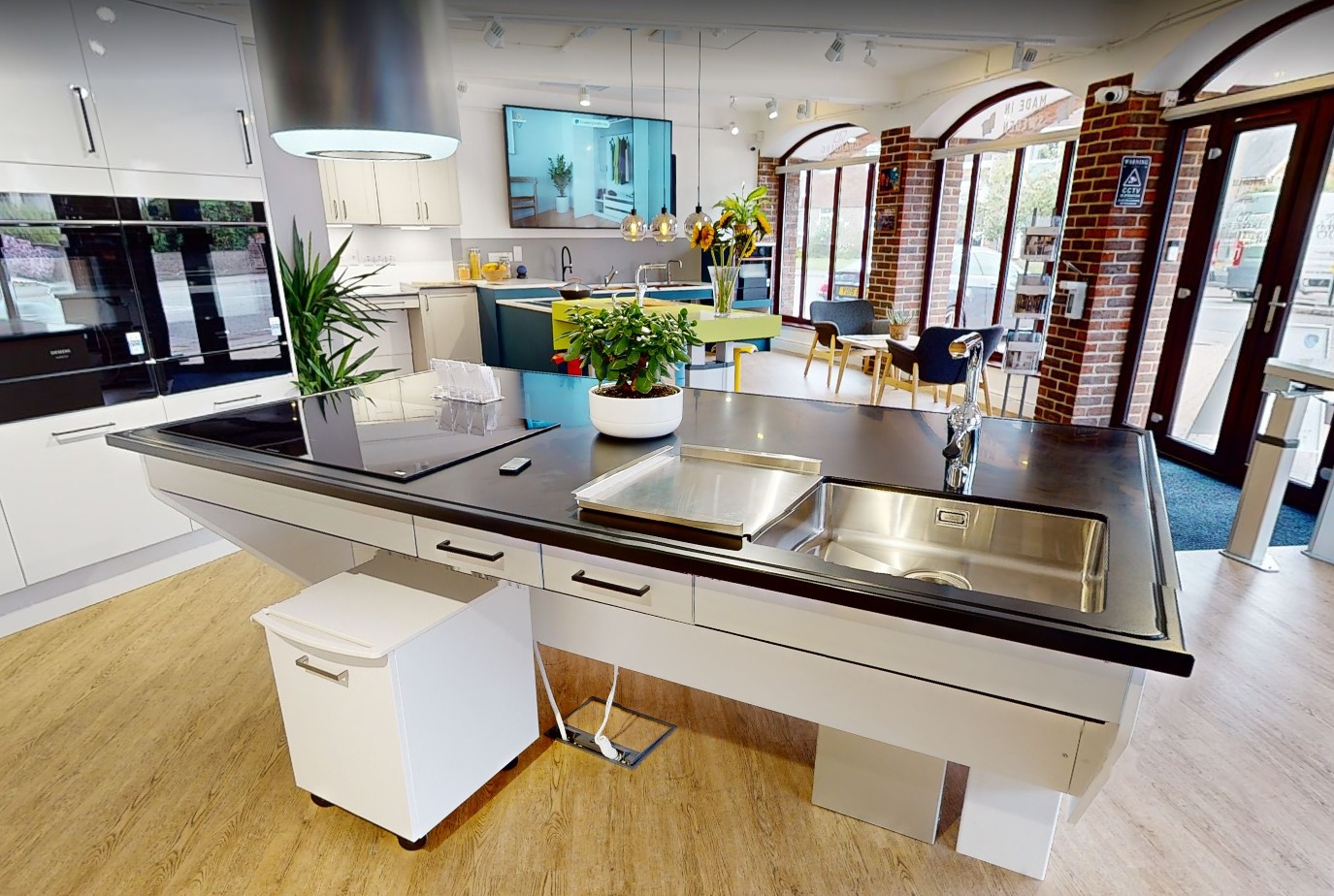 Working height adjustable kitchen displayed in the Independent 4 Life showroom