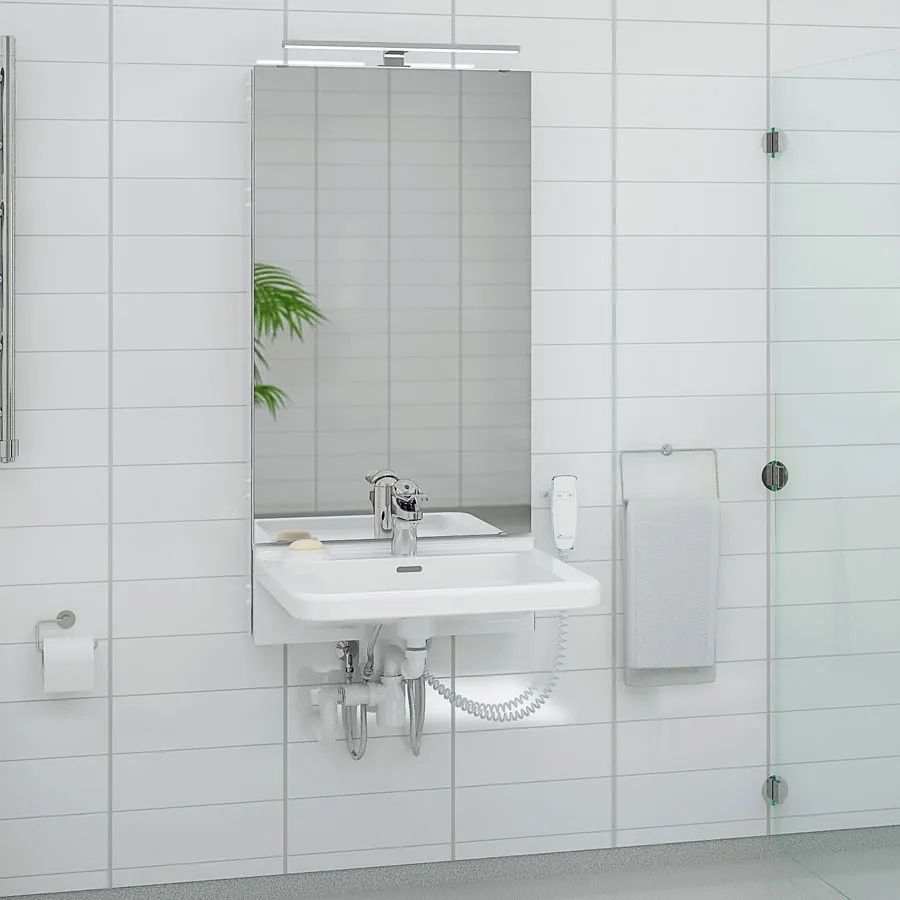 Complete height-adjustable washbasin system showing basin, tap and clear wheelchair access