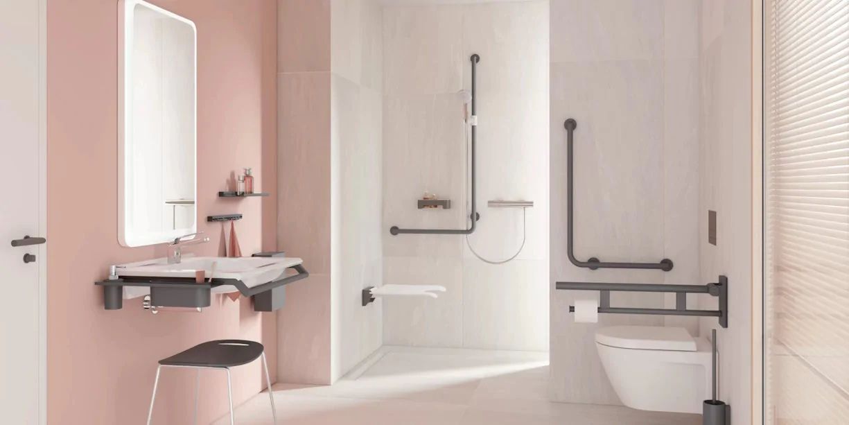 Modern accessible bathroom project with height-adjustable equipment and discreet support systems